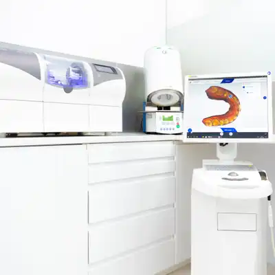 dentist fitting ceramic inlay in Marbella