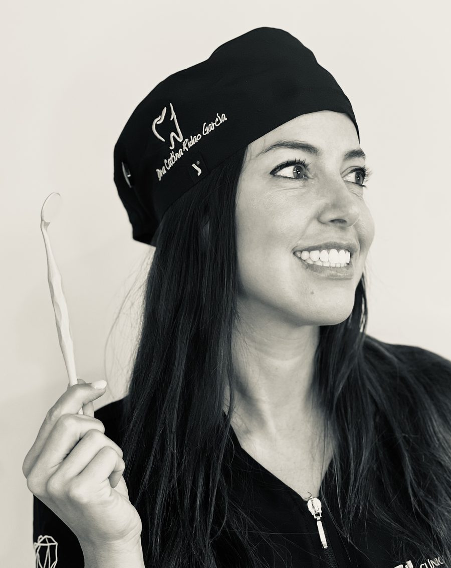 Black-and-white portrait of Dr Catina Ridao from her professional website