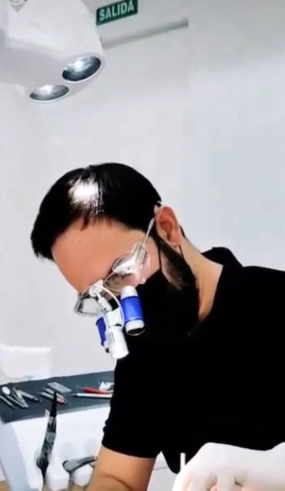 Dr Miguel Romero working in an R&H Dental treatment room in Marbella