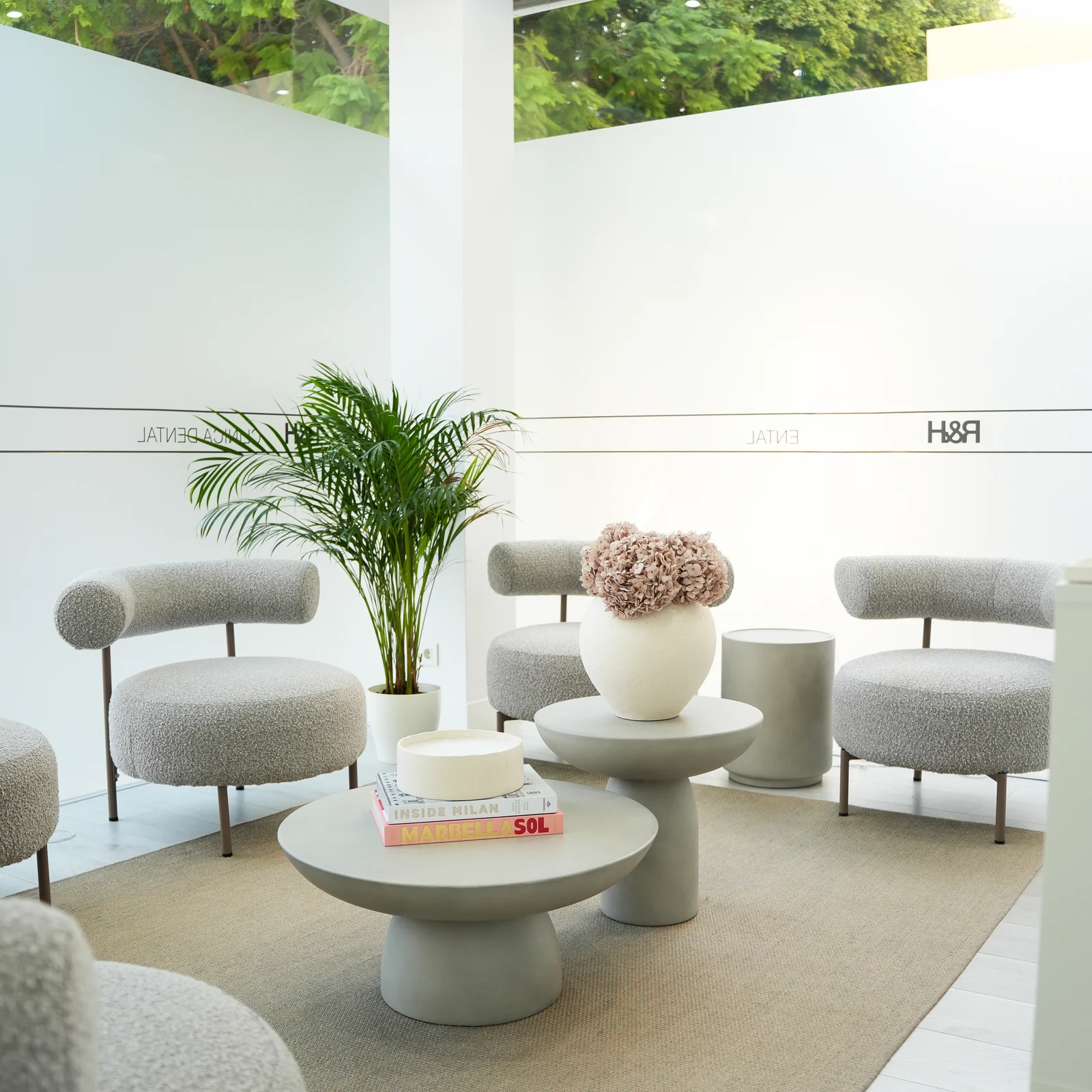 Bright waiting room inside R&H Dental Marbella