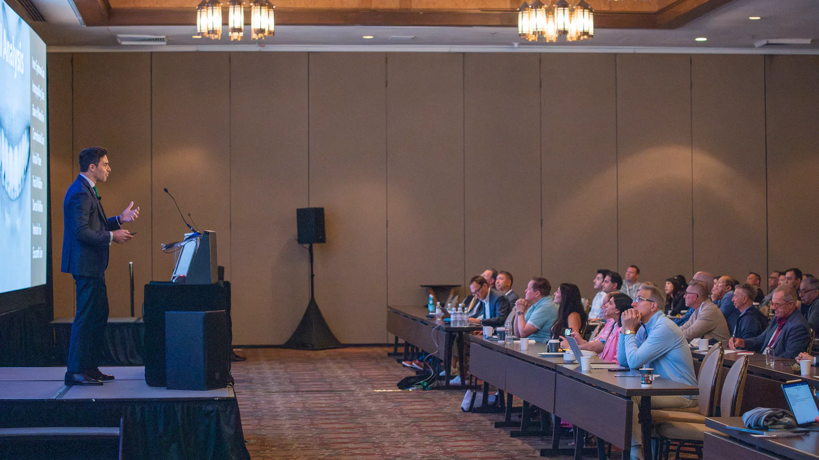 Dr Bruno Pereira lecturing to cosmetic dentists at an international conference